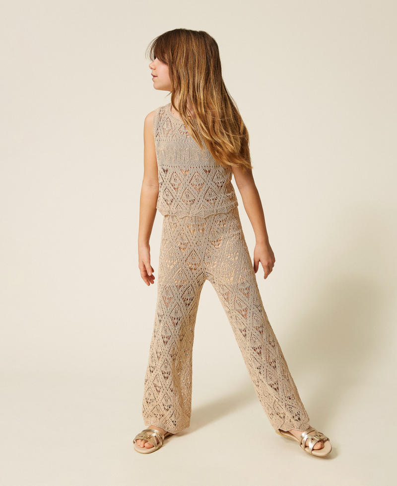 Top e pantaloni ampi in maglia a rombi
