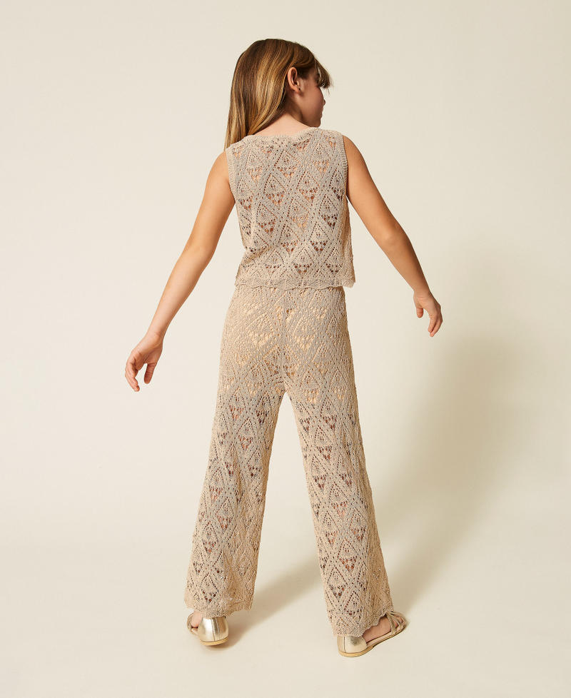Top e pantaloni ampi in maglia a rombi