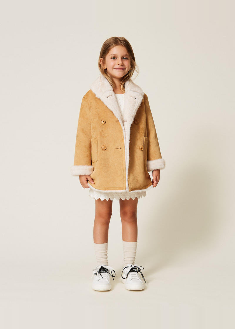 Abito corto baby in maglia a trecce