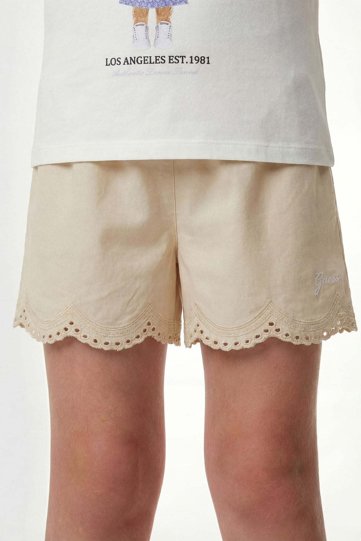 Shorts con occhielli