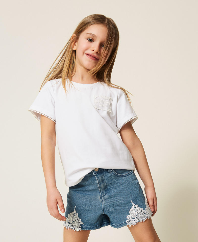 Shorts baby in jeans con pizzo