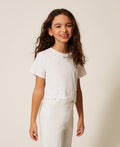 T-shirt con pizzo e logo