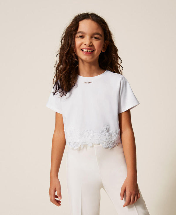 T-shirt con pizzo e logo