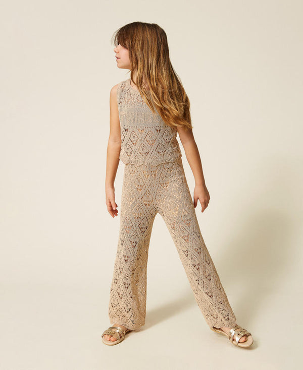 Top e pantaloni ampi in maglia a rombi