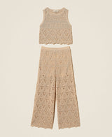 Top e pantaloni ampi in maglia a rombi
