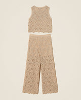 Top e pantaloni ampi in maglia a rombi