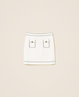 Gonna corta in maglia con impunture