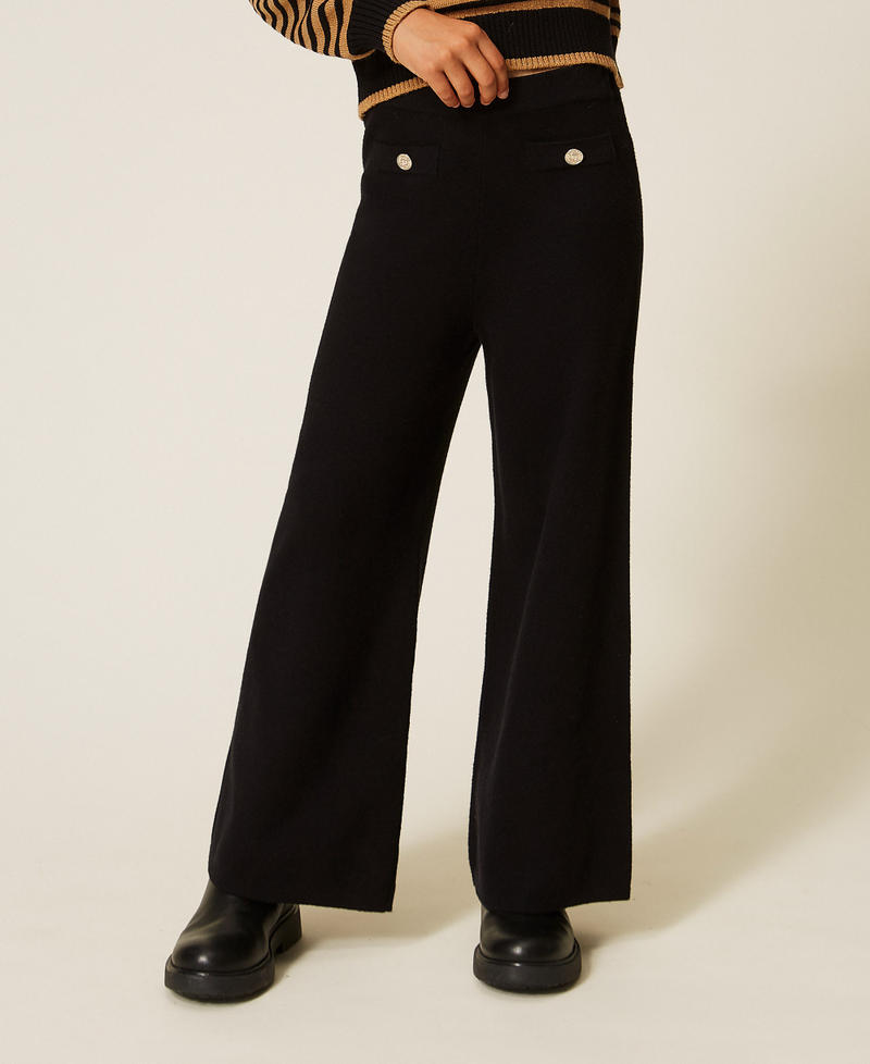 Pantaloni in maglia con bottoni