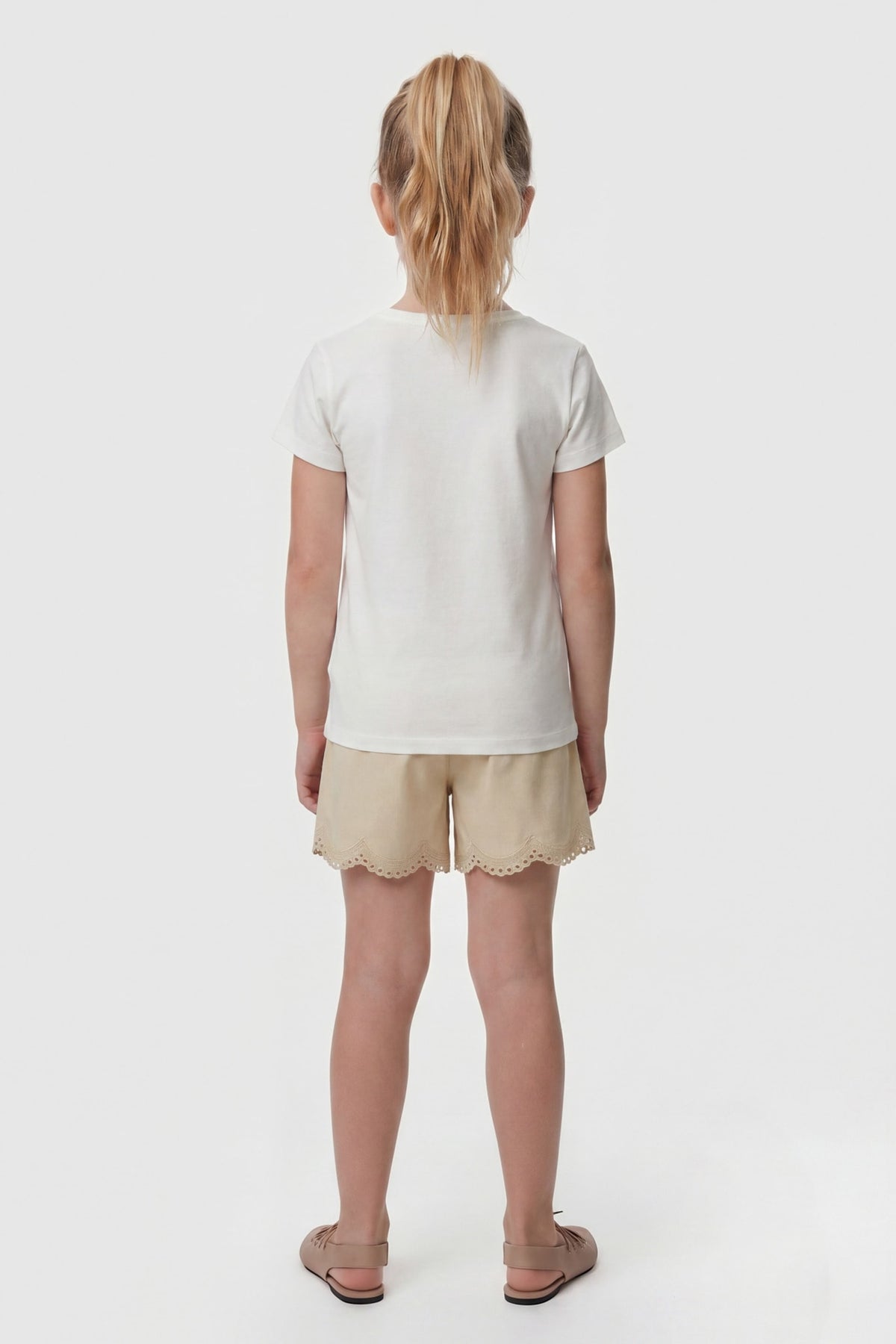 Shorts con occhielli