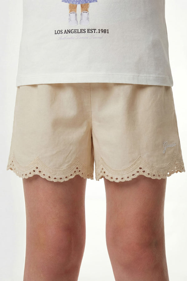 Shorts con occhielli