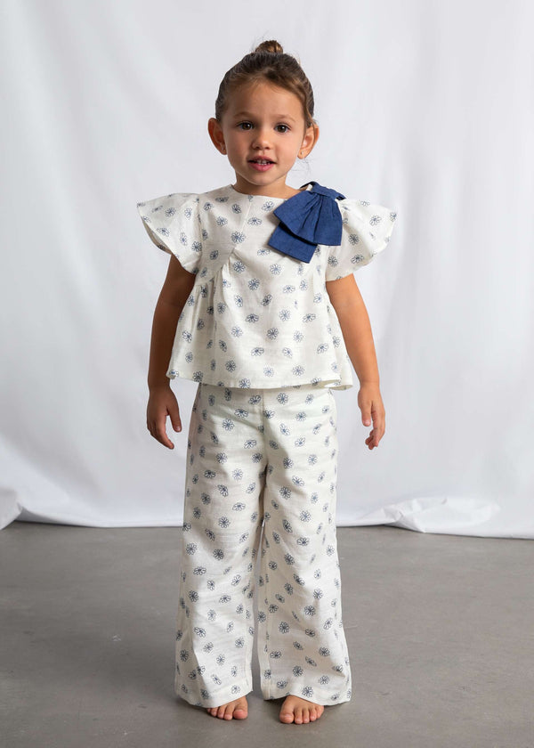 Completo pantalone e top stampato bambina