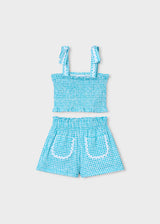 Completo shorts e top nido d'ape bambina