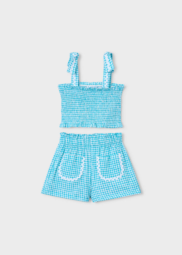 Completo shorts e top nido d'ape bambina