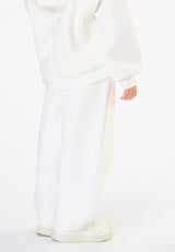 Pantalone in tessuto accoppiato bambina - Latte